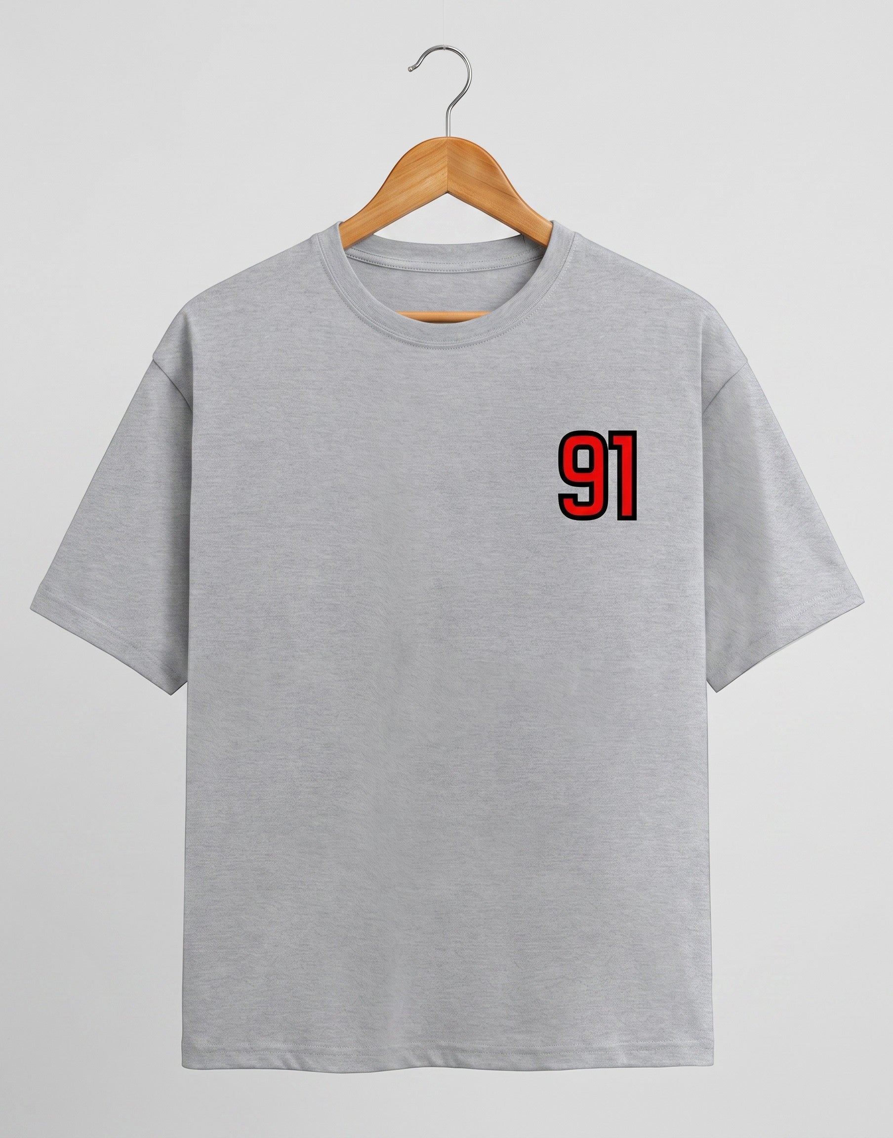 91 Varsity Left Chest graphic t-shirt on GREY unisex classic crew soft-touch 180 GSM cotton, bold red varsity 91 left-chest pocket print signature, black outline varsity number, minimalist placement subtle distinctive, classic crew neckline timeless, unisex regular fit flattering, pre-shrunk bio-washed maintains shape