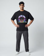 Calm Like A Bomb graphic t-shirt on black unisex 100% cotton crew neck, featuring meditative figure with retro speakers, DTG print 300 DPI