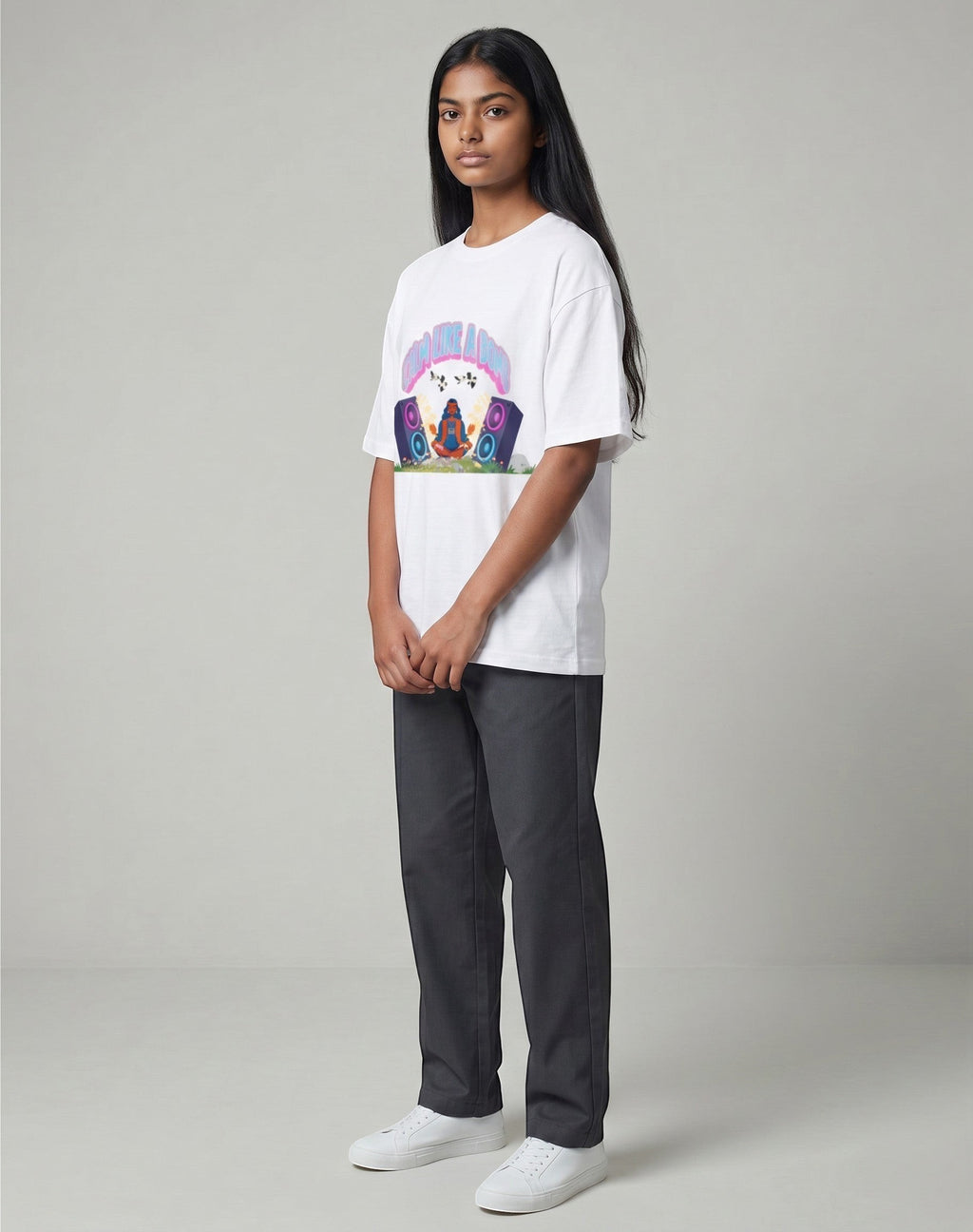 Calm Like A Bomb graphic t-shirt on white unisex 100% cotton crew neck, featuring meditative figure with retro speakers, DTG print 300 DPI