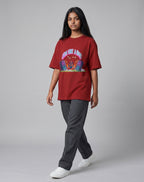 Calm Like A Bomb graphic t-shirt on red unisex 100% cotton crew neck, featuring meditative figure with retro speakers, DTG print 300 DPI