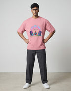 Calm Like A Bomb graphic t-shirt on pink flamingo unisex 100% cotton crew neck, featuring meditative figure with retro speakers, DTG print 300 DPI