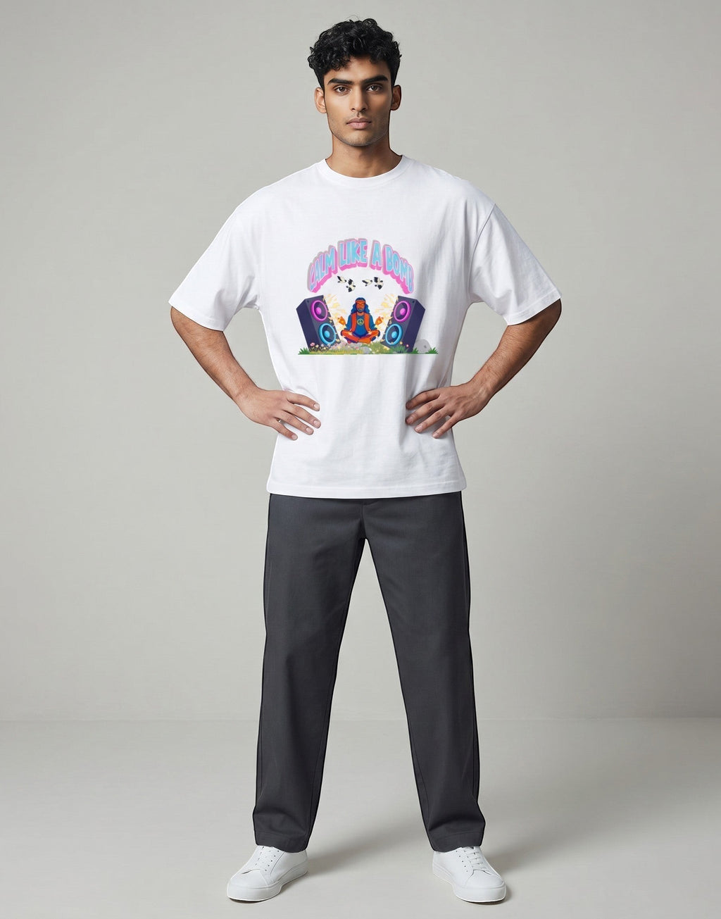 Calm Like A Bomb graphic t-shirt on white unisex 100% cotton crew neck, featuring meditative figure with retro speakers, DTG print 300 DPI