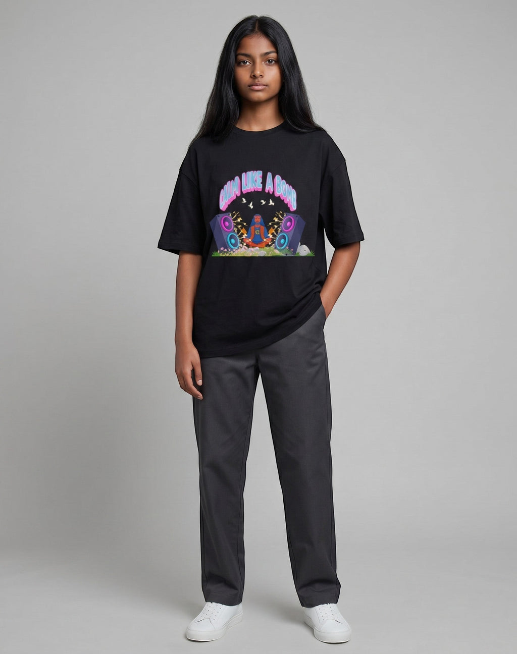 Tribe Neo 91 black unisex cotton crew neck t-shirt with Chill Like A Boss graphic print worn by a woman with trousers