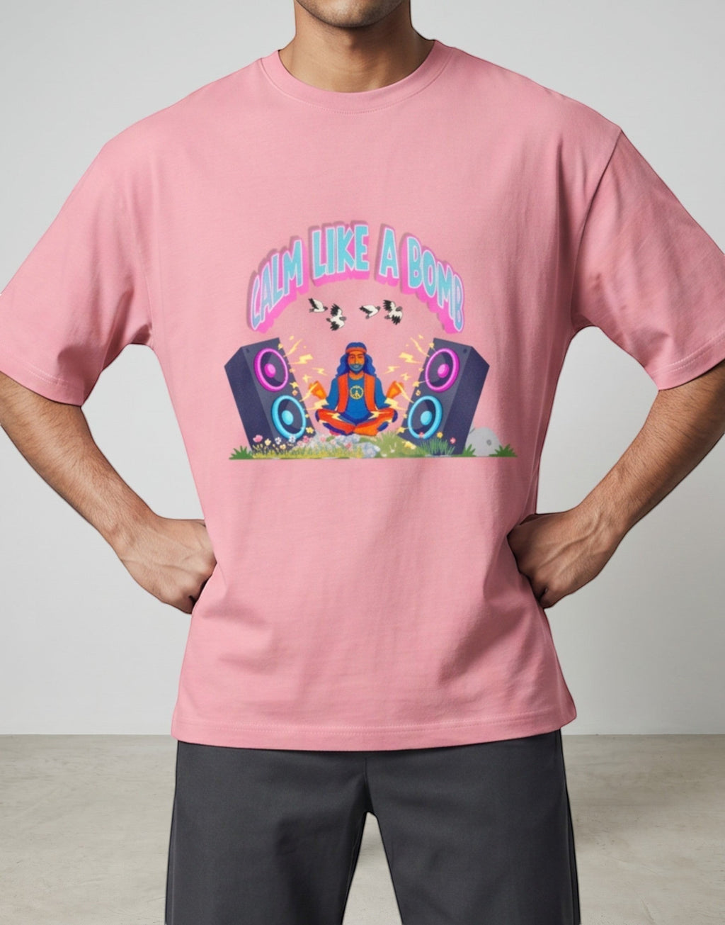 Calm Like A Bomb graphic t-shirt on pink flamingo unisex 100% cotton crew neck, featuring meditative figure with retro speakers, DTG print 300 DPI