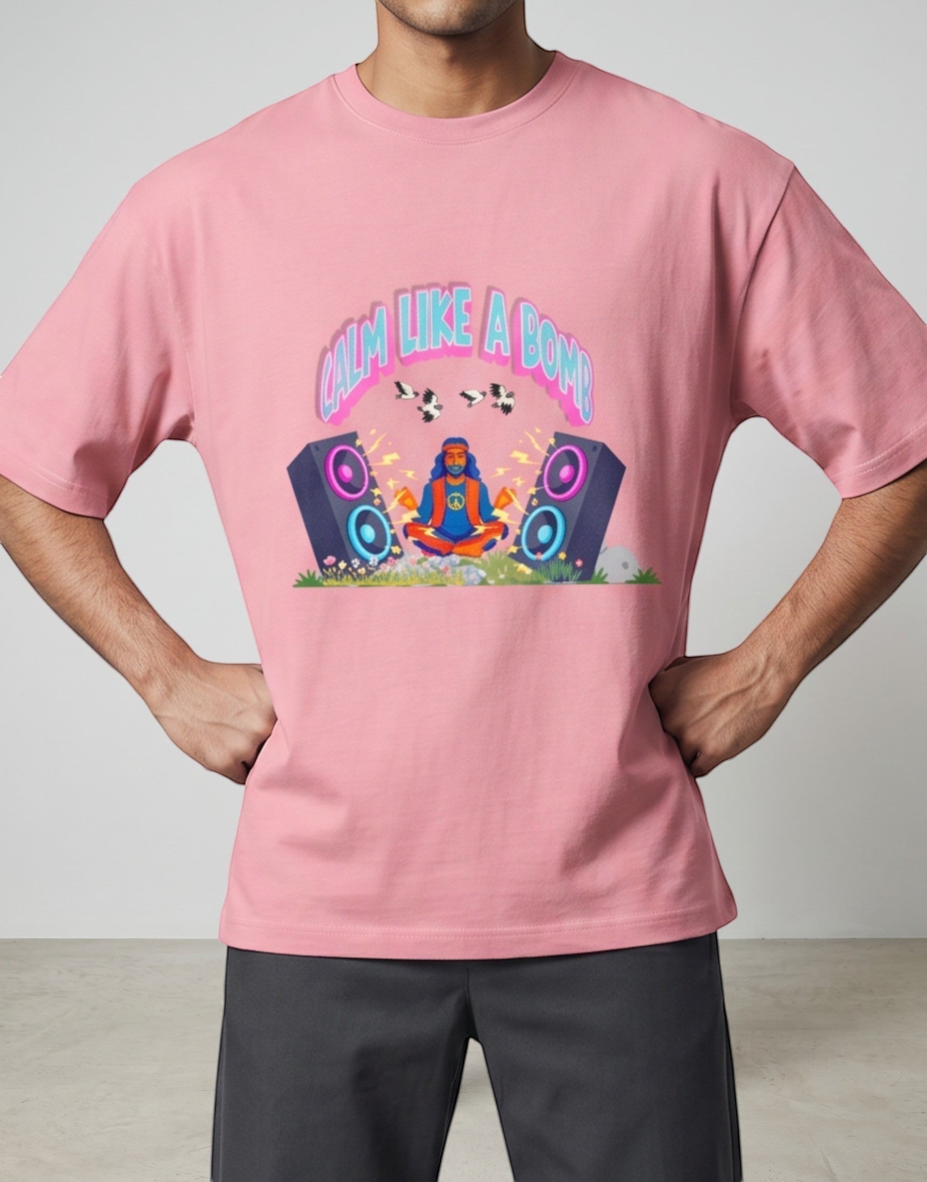 Calm Like A Bomb graphic t-shirt on pink flamingo unisex 100% cotton crew neck, featuring meditative figure with retro speakers, DTG print 300 DPI