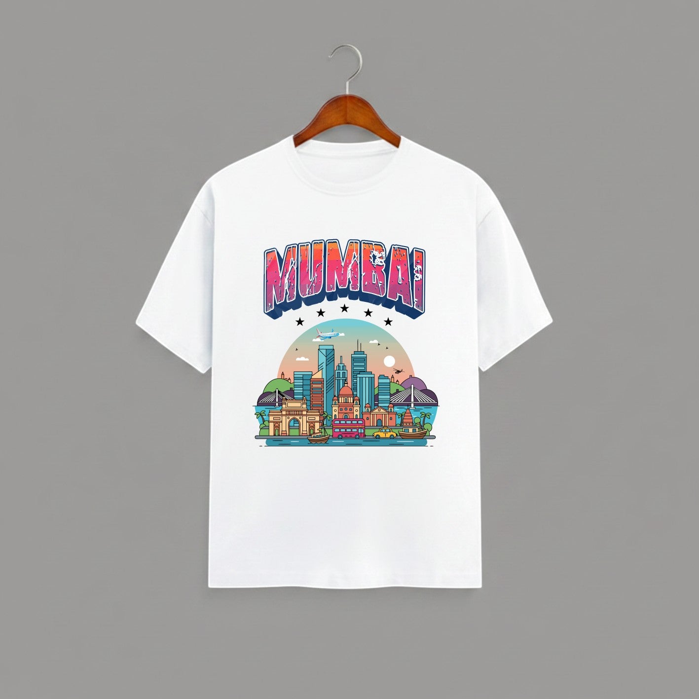 Mumbai Meri Jaan graphic t-shirt with bold MUMBAI lettering, WHITE vibrant skyline artwork, Gateway of India and Bandra-Worli Sea Link city landmarks, unisex classic crew fit, soft 180 GSM cotton tee