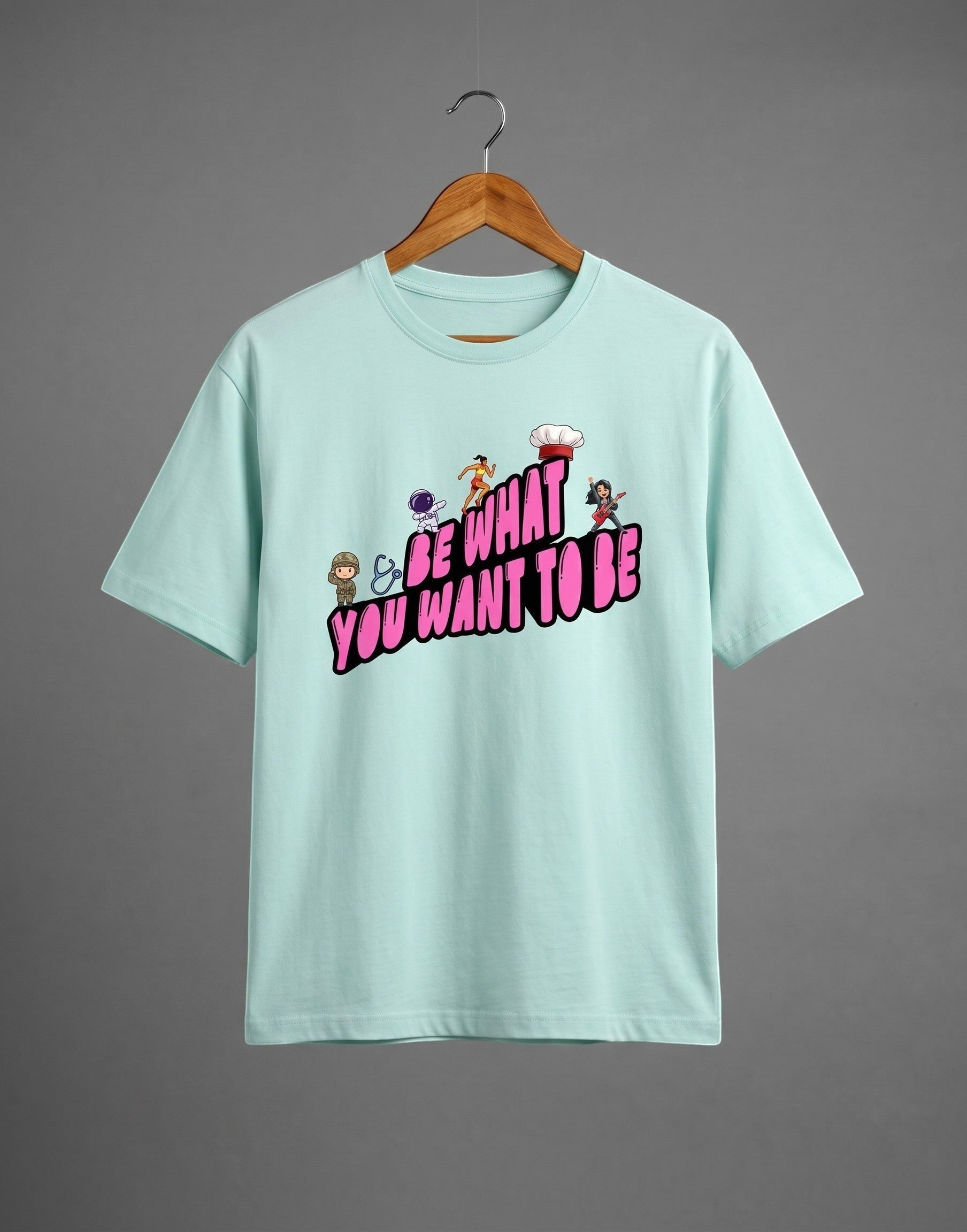 Be What You Want To Be graphic t-shirt on BABY BLUE unisex 100% cotton crew neck, motivational design with astronaut chef rockstar themes, DTG print 300 DPI, 180 GSM breathable