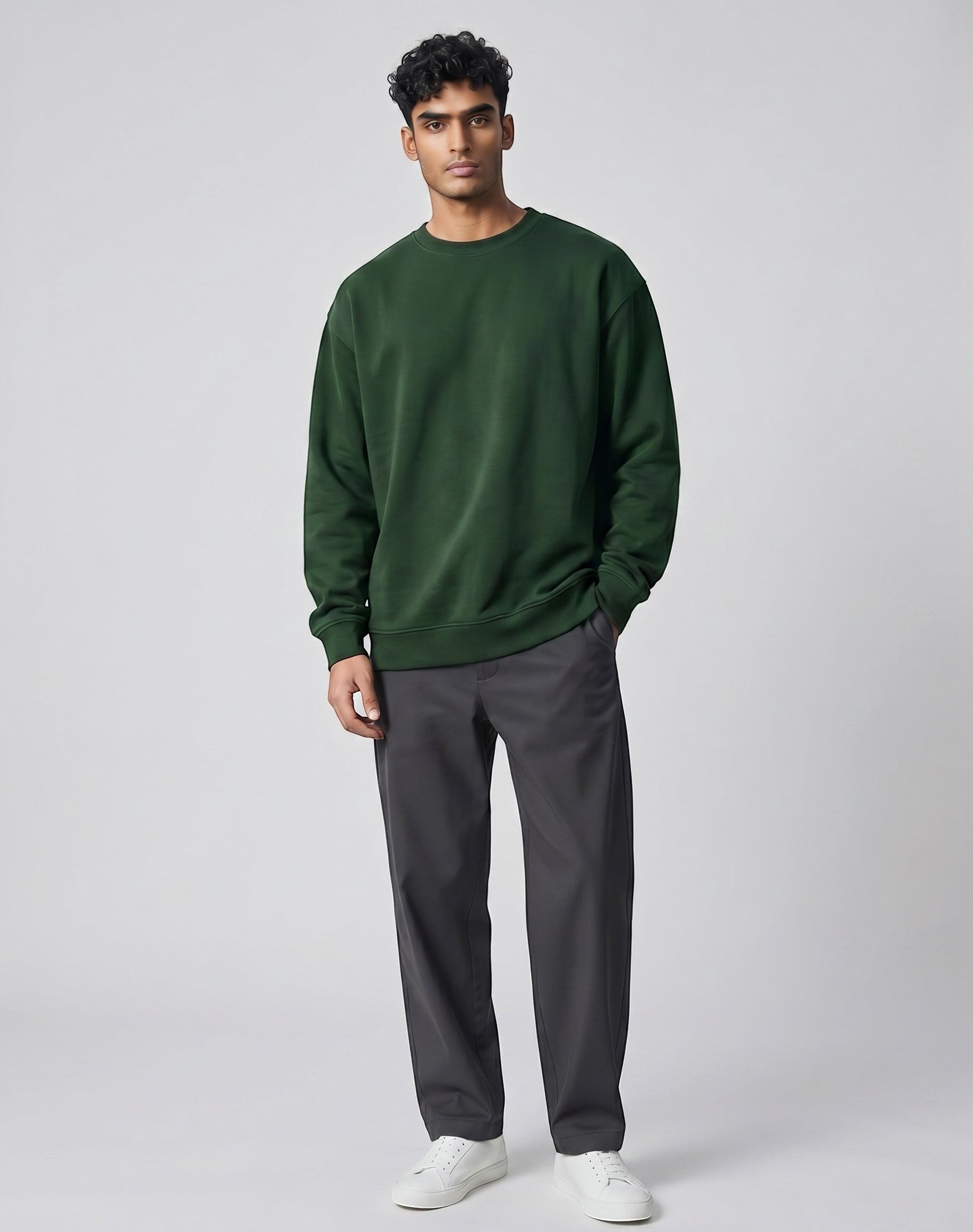 Forest Green Oversized Sweatshirt on FOREST GREEN unisex premium soft-touch fabric crew neck, relaxed roomy fit modern aesthetic, deep rich forest green hue sophisticated, ribbed cuffs hem durable, classic crew neck design, oversized silhouette minimalist look
