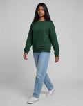 Forest Green Oversized Sweatshirt on FOREST GREEN unisex premium soft-touch fabric crew neck, relaxed roomy fit modern aesthetic, deep rich forest green hue sophisticated, ribbed cuffs hem durable, classic crew neck design, oversized silhouette minimalist look