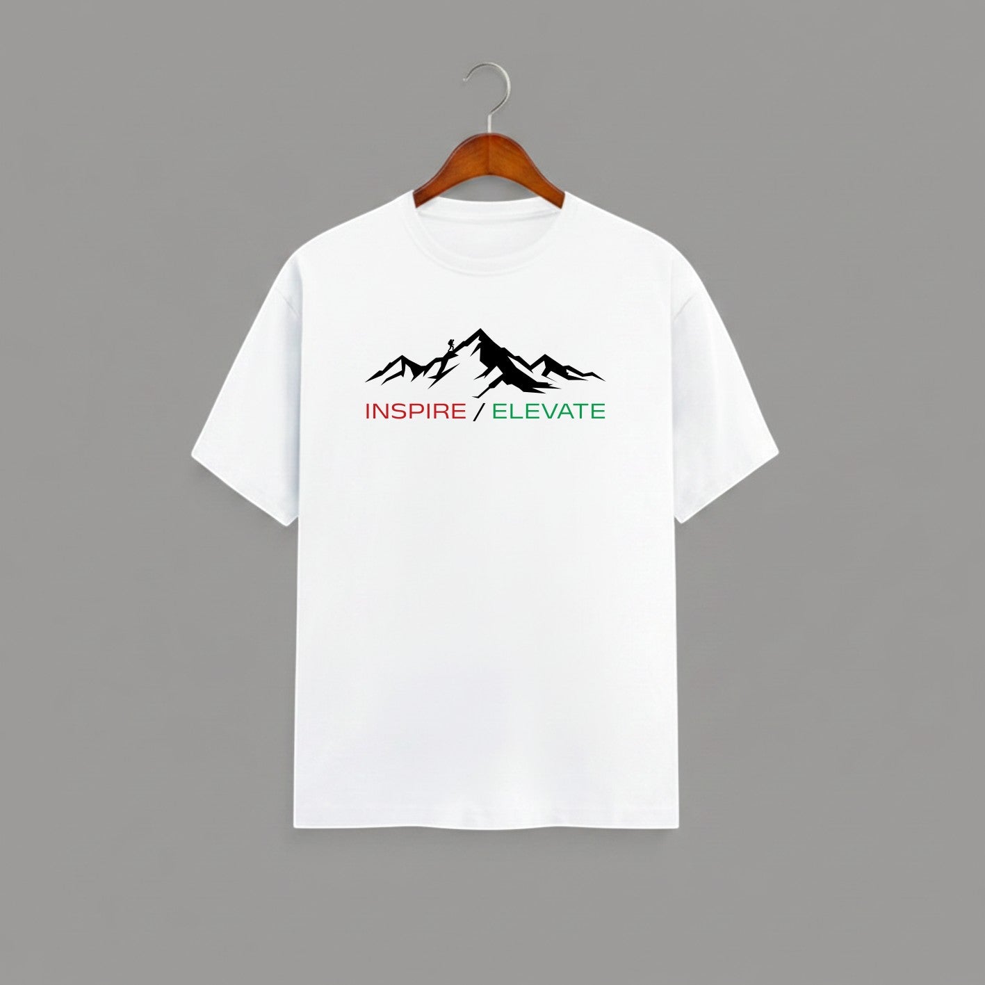 Inspire Elevate Mountain graphic t-shirt on WHITE unisex 100% cotton crew neck, striking mountain graphic with INSPIRE / ELEVATE empowering message, motivational goals design, DTG print 300 DPI, 180 GSM breathable soft fabric