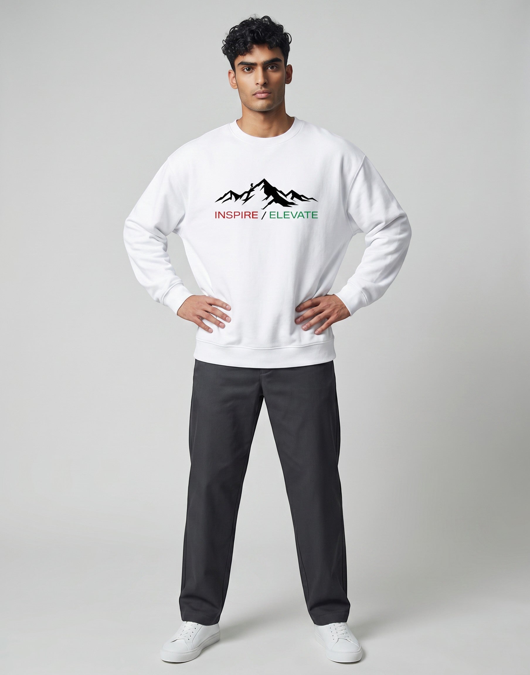 Inspire Elevate Mountain Oversized Sweatshirt on WHITE unisex premium soft-touch fabric blend, relaxed cozy fit feels great all day, bold mountain-inspired graphic chest INSPIRE ELEVATE message, ribbed cuffs timeless look, classic crew neck design, oversized fit maximum comfort, versatile unisex design all body types, unique eye-catching graphic print