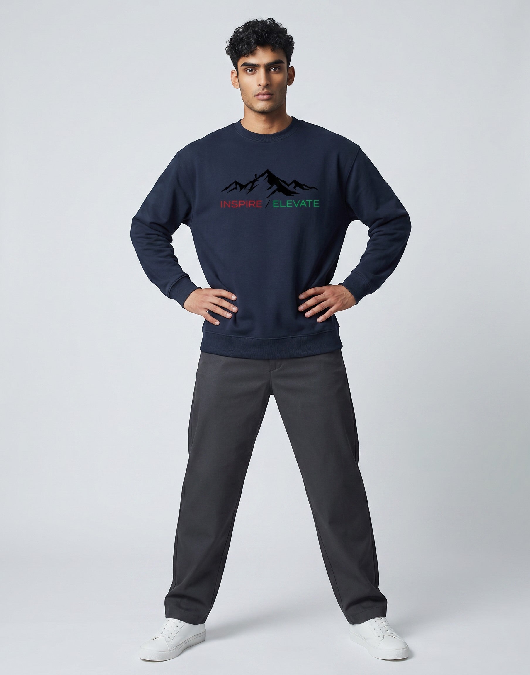 Inspire Elevate Mountain Oversized Sweatshirt on NAVY BLUE unisex premium soft-touch fabric blend, relaxed cozy fit feels great all day, bold mountain-inspired graphic chest INSPIRE ELEVATE message, ribbed cuffs timeless look, classic crew neck design, oversized fit maximum comfort, versatile unisex design all body types, unique eye-catching graphic print