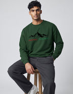 Inspire Elevate Mountain Oversized Sweatshirt on FOREST GREEN unisex premium soft-touch fabric blend, relaxed cozy fit feels great all day, bold mountain-inspired graphic chest INSPIRE ELEVATE message, ribbed cuffs timeless look, classic crew neck design, oversized fit maximum comfort, versatile unisex design all body types, unique eye-catching graphic print