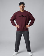 Inspire Elevate Mountain Oversized Sweatshirt on MAROON unisex premium soft-touch fabric blend, relaxed cozy fit feels great all day, bold mountain-inspired graphic chest INSPIRE ELEVATE message, ribbed cuffs timeless look, classic crew neck design, oversized fit maximum comfort, versatile unisex design all body types, unique eye-catching graphic print
