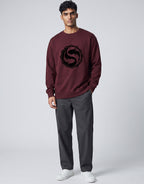 Koi Fish Yin-Yang Oversized Sweatshirt on MAROON unisex premium soft-touch fabric, relaxed oversized fit contemporary look, striking koi fish yin-yang graphic unique symbolic touch, ribbed cuffs hem secure fit, structured modern silhouette, bold eye-catching koi fish graphic, versatile unisex design complements wardrobe, relaxed fit without compromising aesthetic