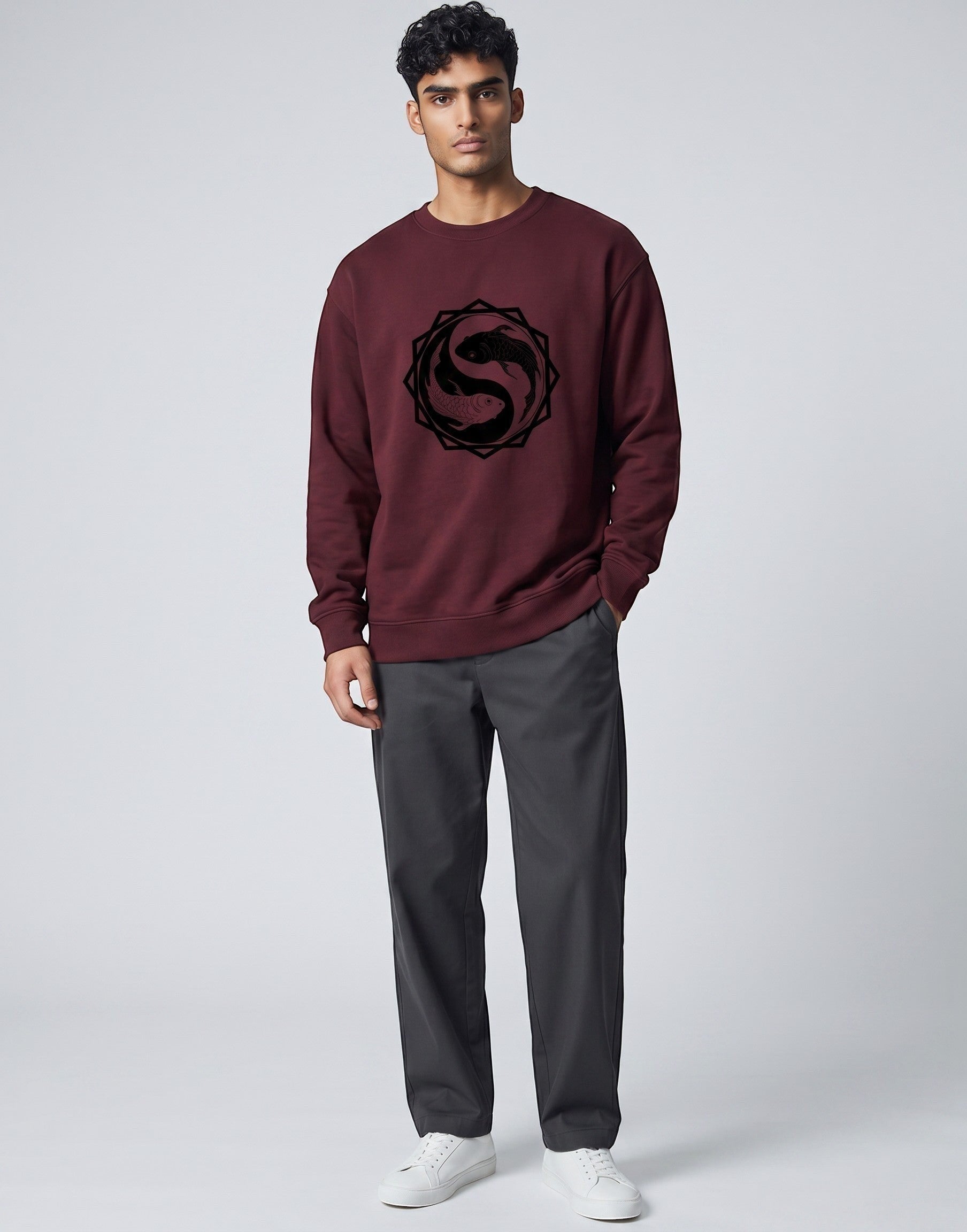 Koi Fish Yin-Yang Oversized Sweatshirt on MAROON unisex premium soft-touch fabric, relaxed oversized fit contemporary look, striking koi fish yin-yang graphic unique symbolic touch, ribbed cuffs hem secure fit, structured modern silhouette, bold eye-catching koi fish graphic, versatile unisex design complements wardrobe, relaxed fit without compromising aesthetic