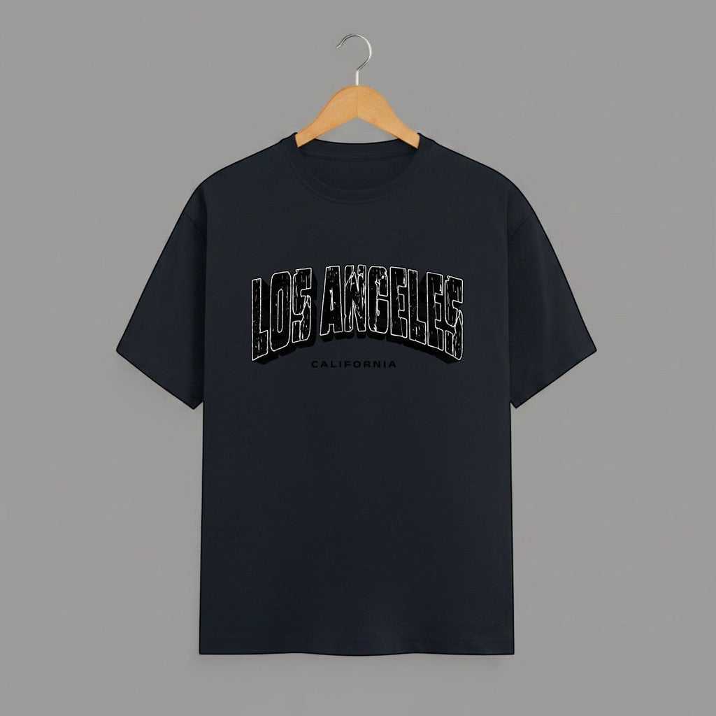 Los Angeles California graphic t-shirt on NAVY BLUE unisex classic crew soft-touch 180 GSM cotton, distressed LOS ANGELES collegiate arch lettering bold CA graphic, California subtitle clean spaced caps, monochrome black-on-white minimal versatile, classic crew neckline timeless, unisex regular fit flattering, pre-shrunk bio-washed maintains shape