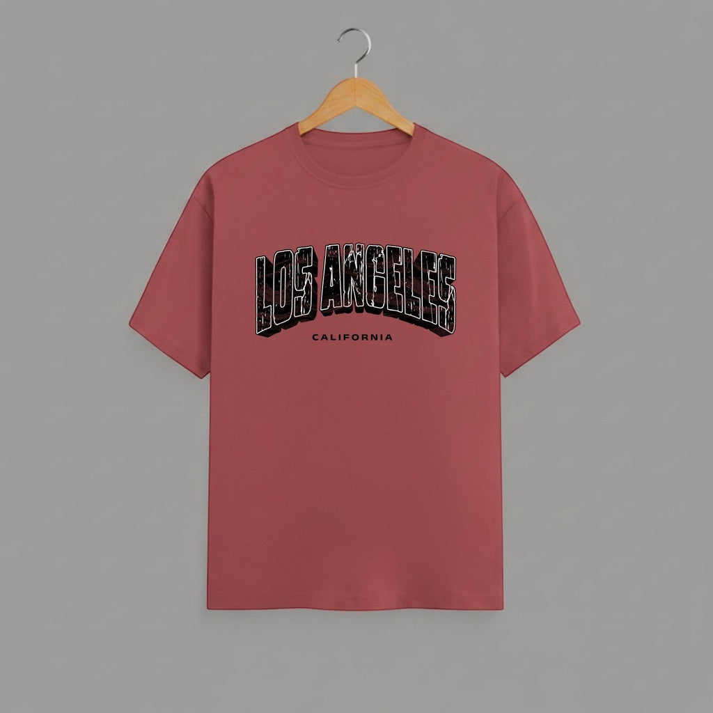 Los Angeles California graphic t-shirt on CORAL unisex classic crew soft-touch 180 GSM cotton, distressed LOS ANGELES collegiate arch lettering bold CA graphic, California subtitle clean spaced caps, monochrome black-on-white minimal versatile, classic crew neckline timeless, unisex regular fit flattering, pre-shrunk bio-washed maintains shape