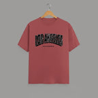 Los Angeles California graphic t-shirt on CORAL unisex classic crew soft-touch 180 GSM cotton, distressed LOS ANGELES collegiate arch lettering bold CA graphic, California subtitle clean spaced caps, monochrome black-on-white minimal versatile, classic crew neckline timeless, unisex regular fit flattering, pre-shrunk bio-washed maintains shape