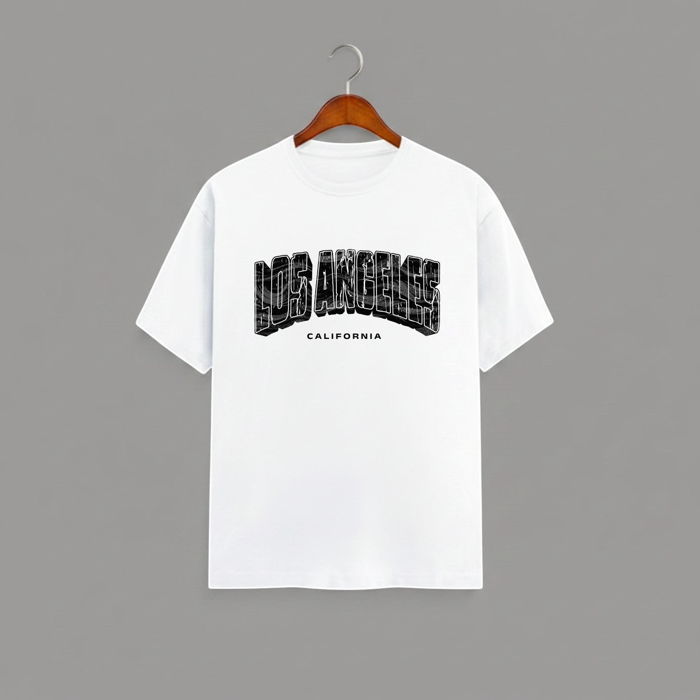 Los Angeles California graphic t-shirt on WHITE unisex classic crew soft-touch 180 GSM cotton, distressed LOS ANGELES collegiate arch lettering bold CA graphic, California subtitle clean spaced caps, monochrome black-on-white minimal versatile, classic crew neckline timeless, unisex regular fit flattering, pre-shrunk bio-washed maintains shape