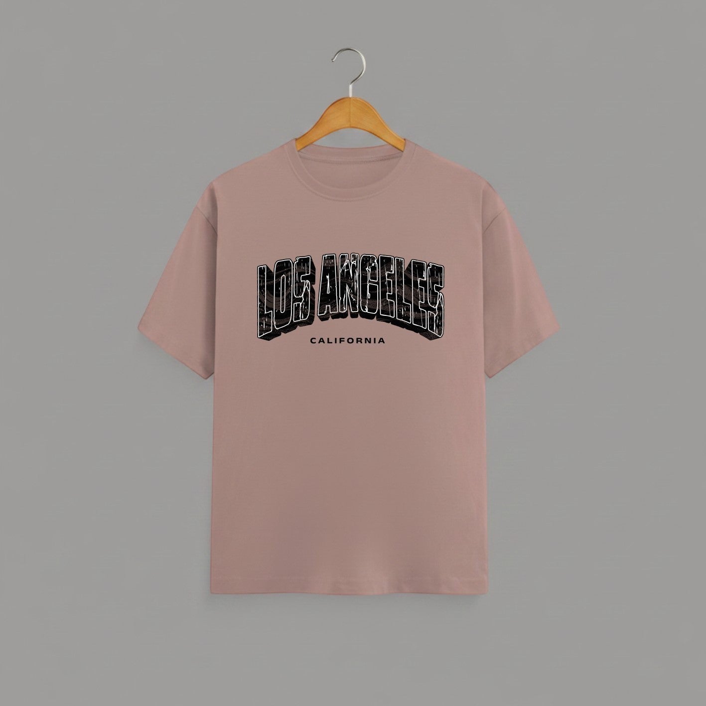 Los Angeles California graphic t-shirt on MUSHROOM BROWN unisex classic crew soft-touch 180 GSM cotton, distressed LOS ANGELES collegiate arch lettering bold CA graphic, California subtitle clean spaced caps, monochrome black-on-white minimal versatile, classic crew neckline timeless, unisex regular fit flattering, pre-shrunk bio-washed maintains shape