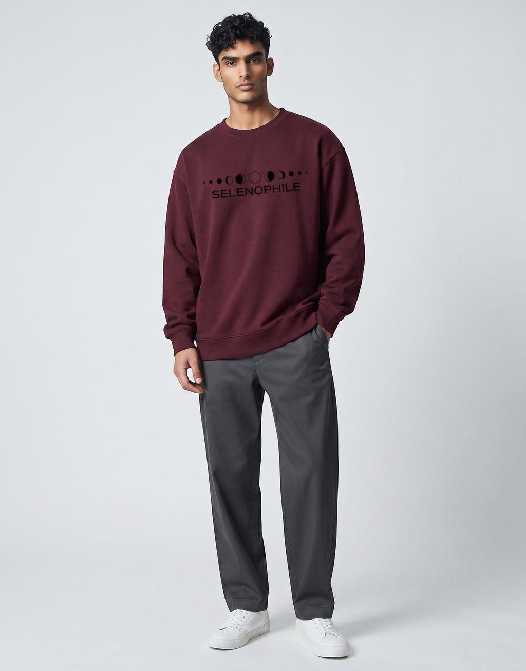 Lunar-Inspired Graphic Oversized Sweatshirt on MAROON unisex premium soft-touch fabric blend, relaxed oversized fit modern silhouette, unique lunar-inspired graphic chest celebrating love moon, ribbed crew neckline cuffs hem structured, clean minimalist aesthetic, contemporary look, unisex timeless inclusive style, premium durable fabric soft skin