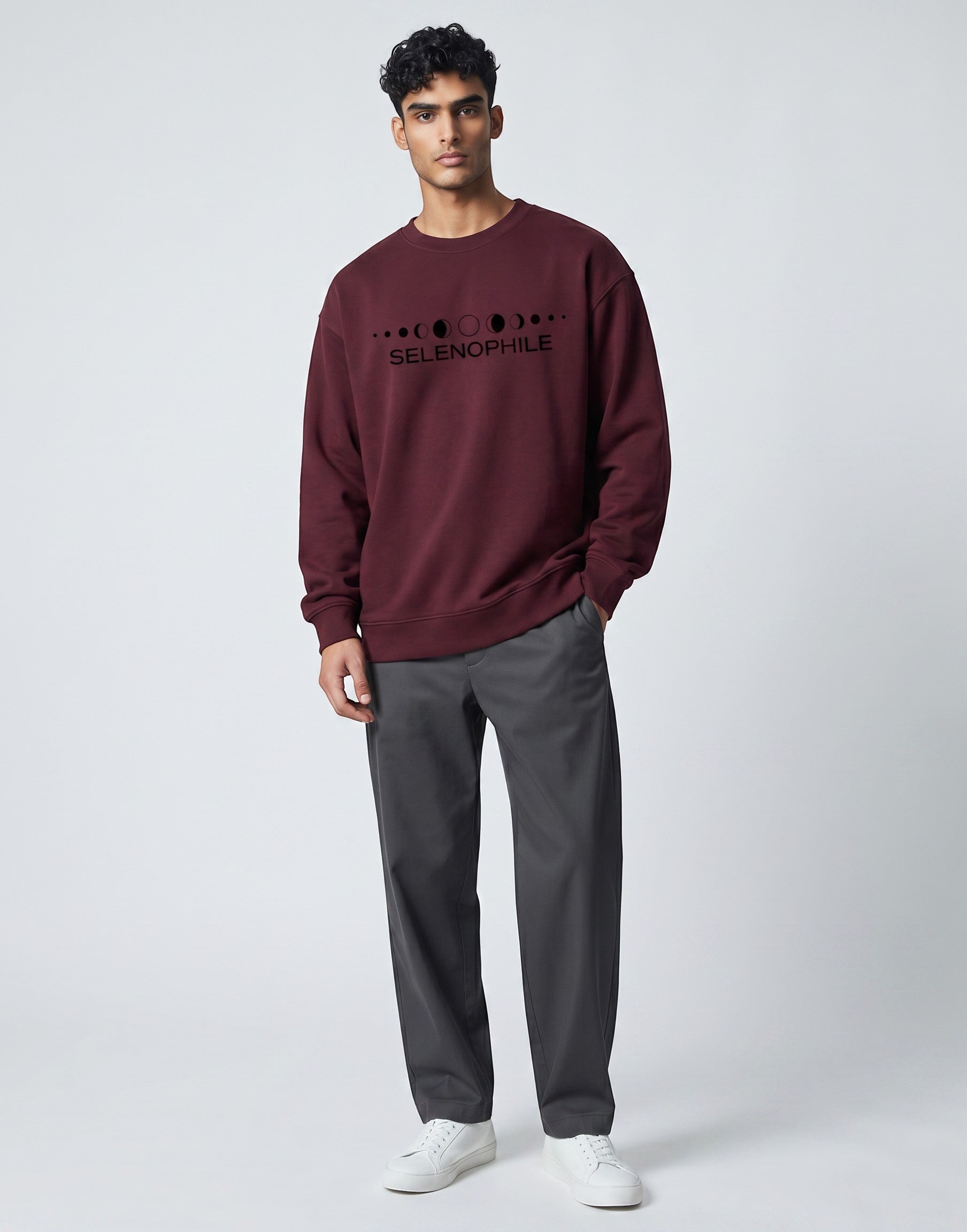 Lunar-Inspired Graphic Oversized Sweatshirt on MAROON unisex premium soft-touch fabric blend, relaxed oversized fit modern silhouette, unique lunar-inspired graphic chest celebrating love moon, ribbed crew neckline cuffs hem structured, clean minimalist aesthetic, contemporary look, unisex timeless inclusive style, premium durable fabric soft skin