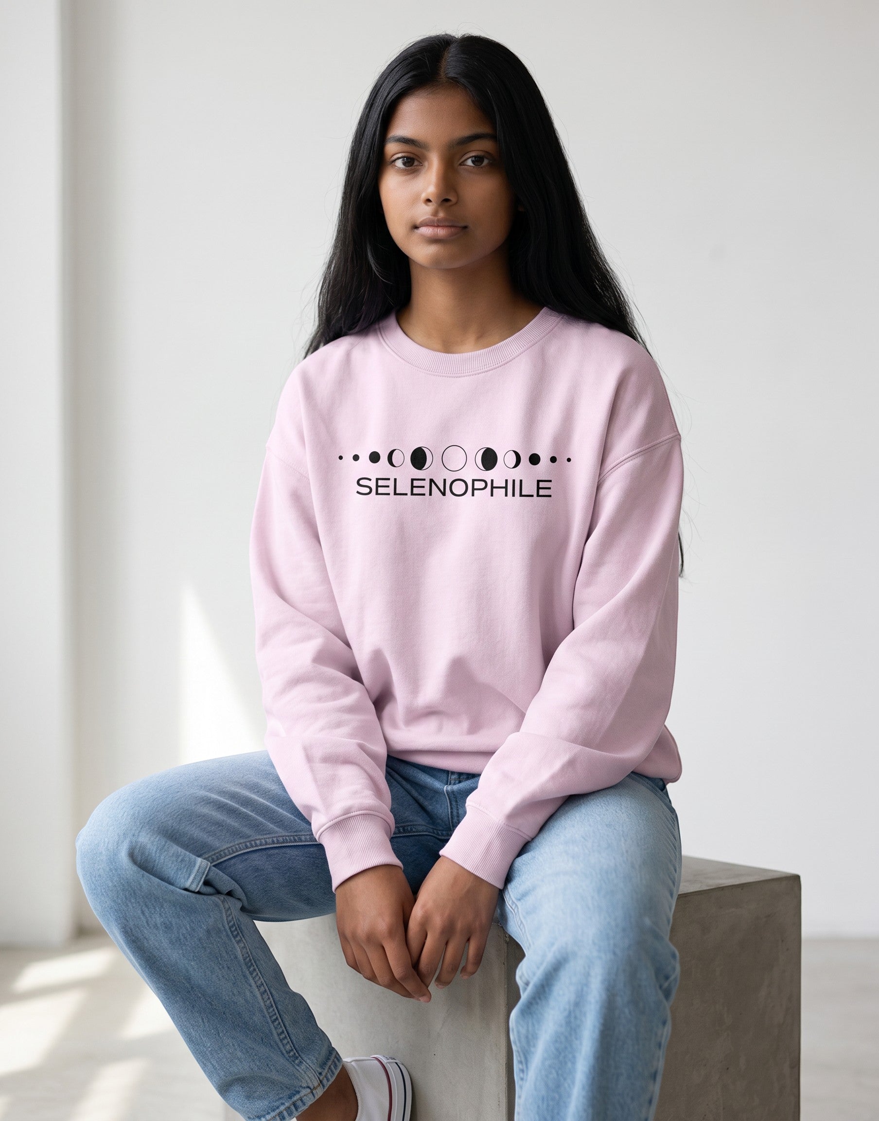 Lunar-Inspired Graphic Oversized Sweatshirt on BABY PINK unisex premium soft-touch fabric blend, relaxed oversized fit modern silhouette, unique lunar-inspired graphic chest celebrating love moon, ribbed crew neckline cuffs hem structured, clean minimalist aesthetic, contemporary look, unisex timeless inclusive style, premium durable fabric soft skin