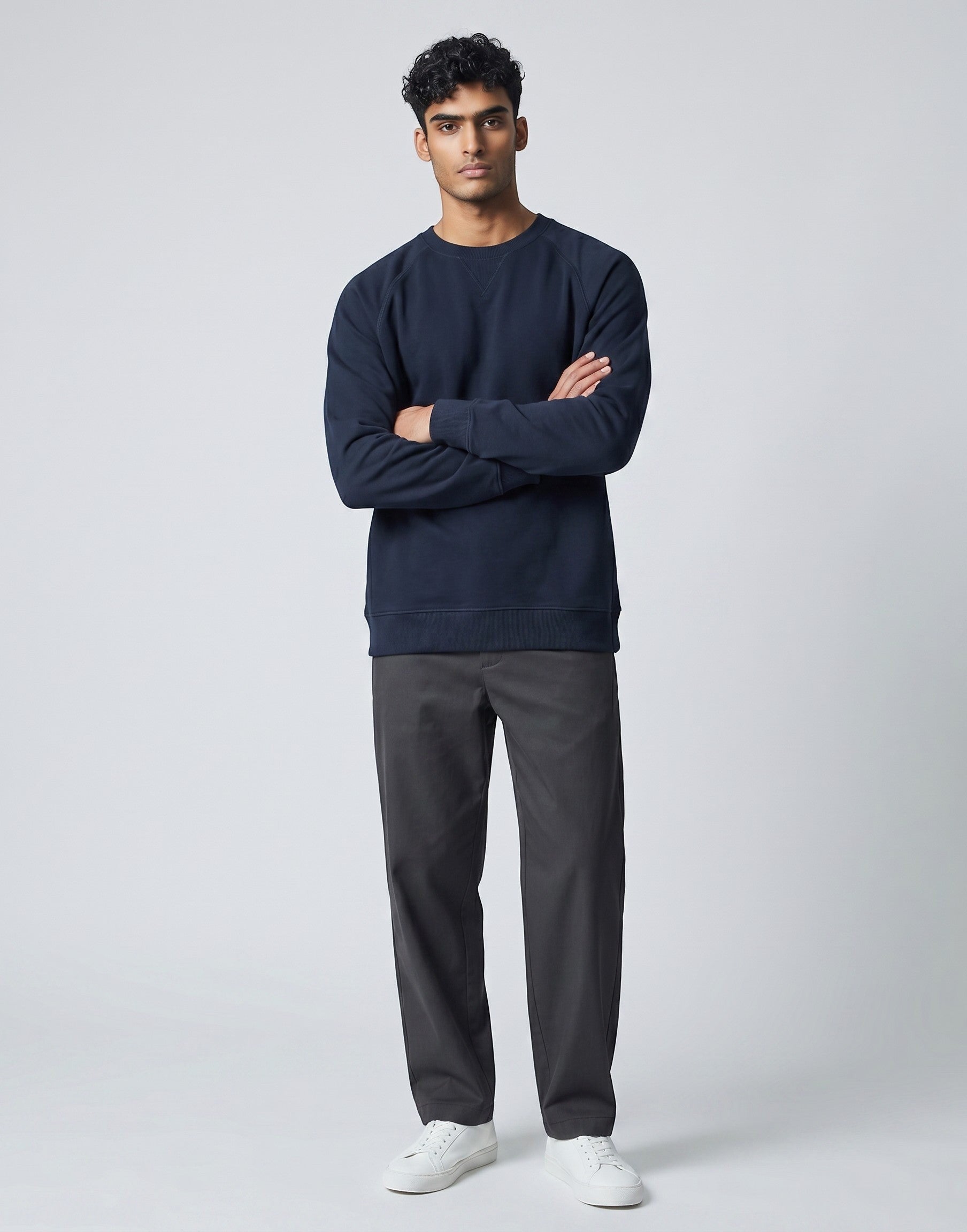 Navy Oversized Sweatshirt on NAVY unisex premium soft-touch cotton blend crew neck, relaxed roomy fit heritage-inspired character, subtle V-stitch detailing collar, durable ribbed crew neckline cuffs hem, classic navy hue timeless aesthetic, oversized silhouette gender-neutral
