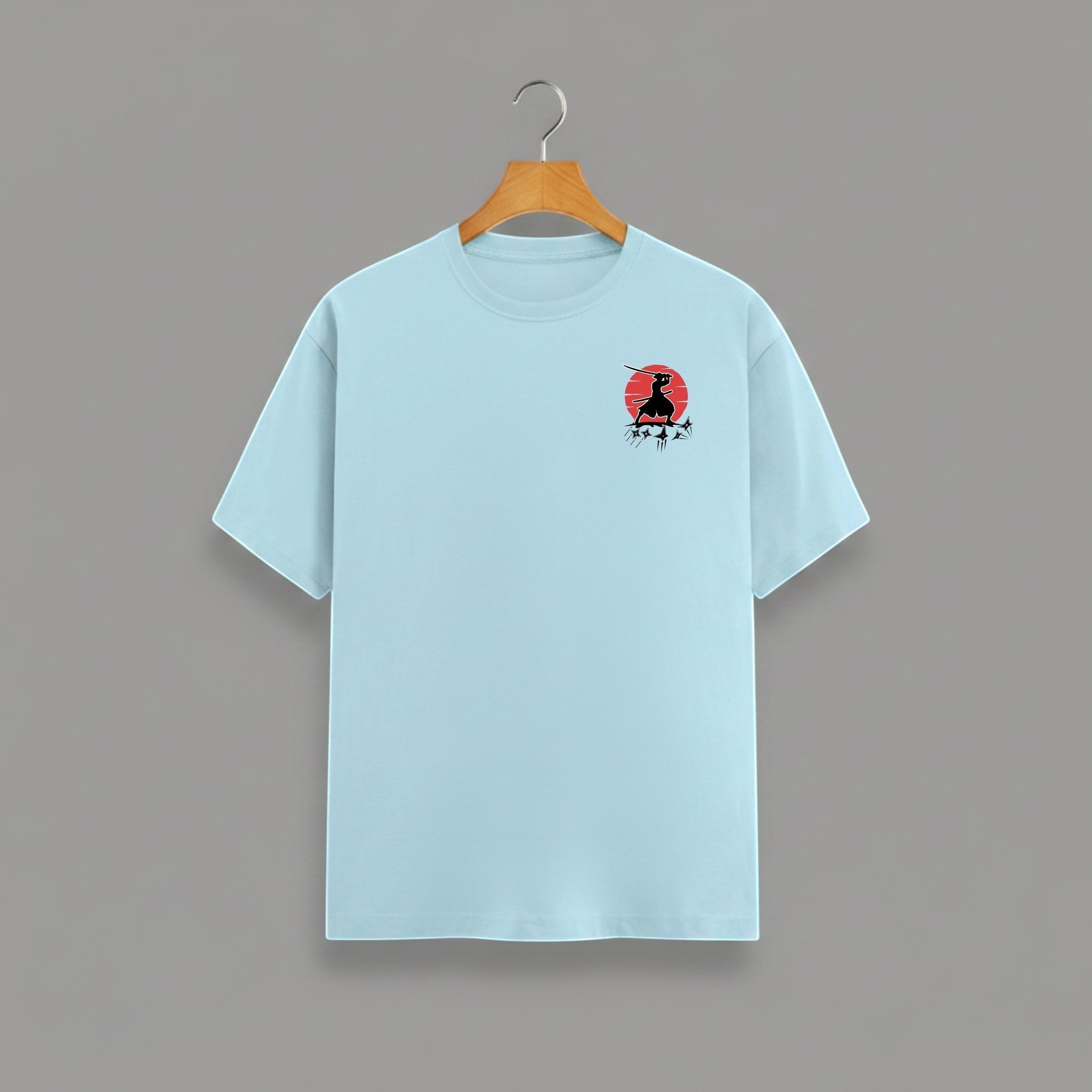 Samurai Red Sun graphic t-shirt on BABY BLUE unisex 100% cotton crew neck, striking samurai-inspired silhouette against bold red sun, unique high-quality chest graphic, minimalist Japanese design, DTG print 300 DPI, 180 GSM breathable soft fabric