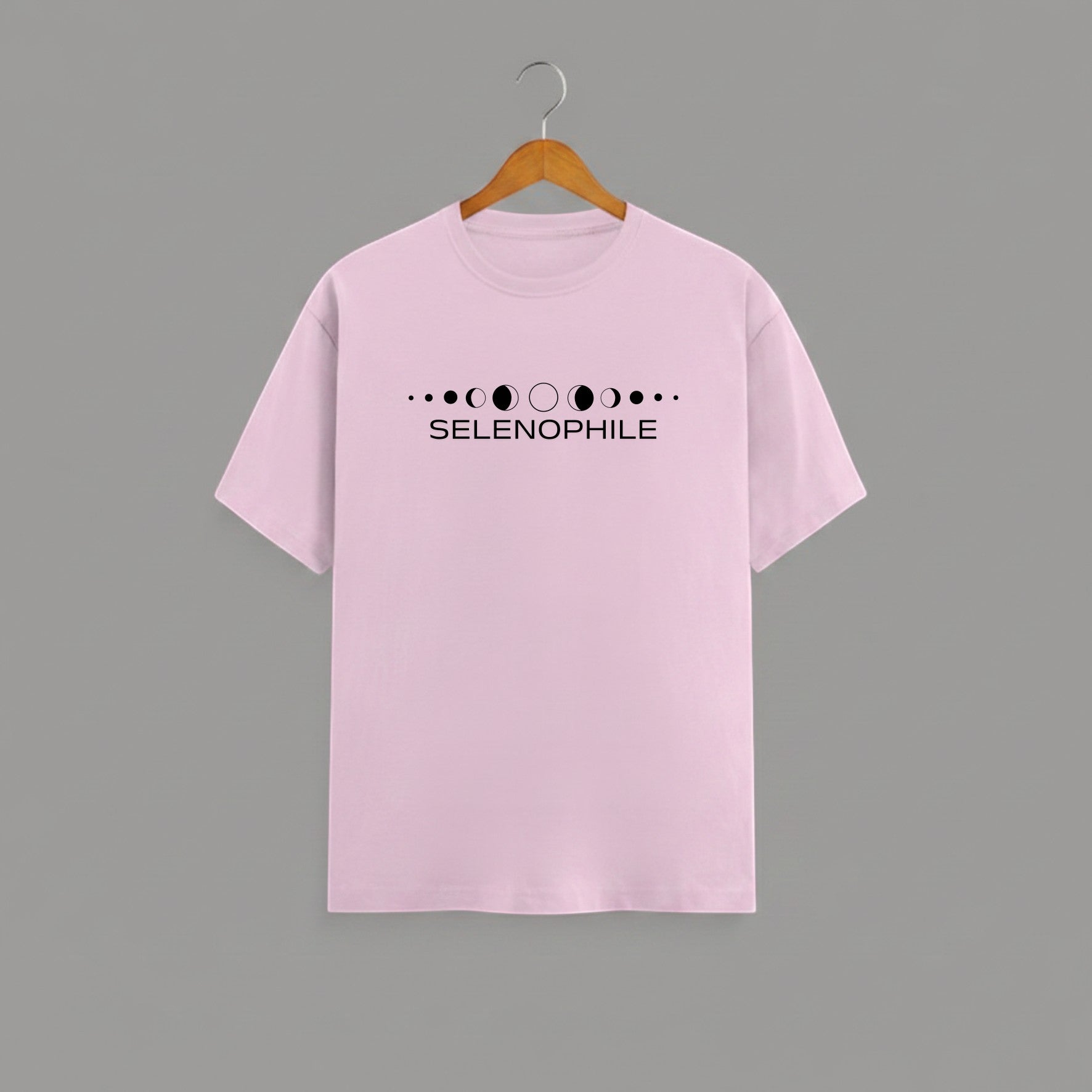 Selenophile Moon Phase T-Shirt on BABY PINK unisex classic crew, relaxed comfortable fit everyday wear, minimalist moon phase graphic Selenophile word chest celestial passion, durable crew neckline classic look, soft breathable fabric all-day comfort, high-quality fade-resistant graphic print, unisex design flattering fit all body types, lightweight breathable material year-round