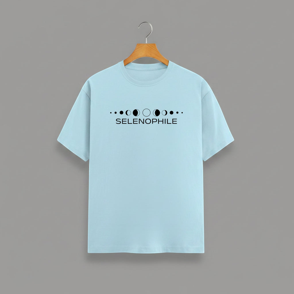 Selenophile Moon Phase T-Shirt on BABY BLUE unisex classic crew, relaxed comfortable fit everyday wear, minimalist moon phase graphic Selenophile word chest celestial passion, durable crew neckline classic look, soft breathable fabric all-day comfort, high-quality fade-resistant graphic print, unisex design flattering fit all body types, lightweight breathable material year-round