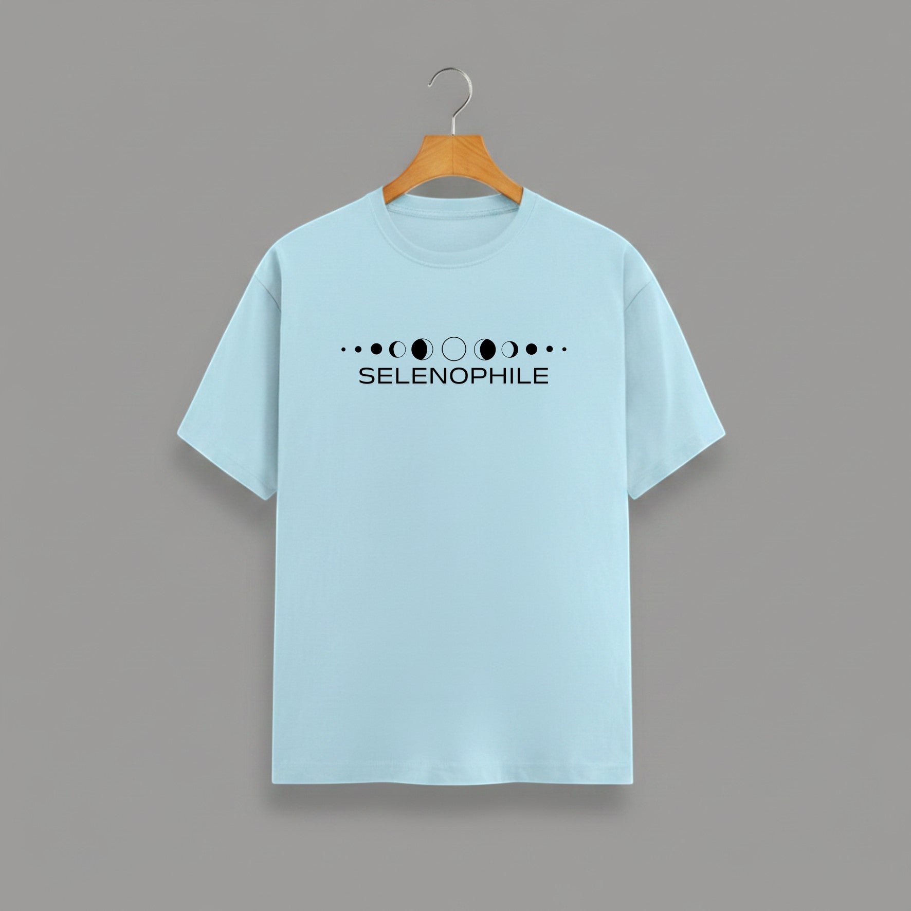Selenophile Moon Phase T-Shirt on BABY BLUE unisex classic crew, relaxed comfortable fit everyday wear, minimalist moon phase graphic Selenophile word chest celestial passion, durable crew neckline classic look, soft breathable fabric all-day comfort, high-quality fade-resistant graphic print, unisex design flattering fit all body types, lightweight breathable material year-round