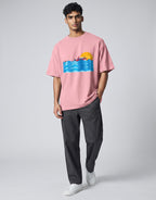 Sunset Boat graphic t-shirt on FLAMINGO unisex 100% cotton crew neck, vibrant high-quality serene sunset boat scene, artistic flair beach design, DTG print 300 DPI, 180 GSM breathable soft fabric