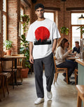 Tribe Neo 91 oversized white cotton t-shirt with a red blood moon and gothic graveyard graphic worn by a man in a cafe