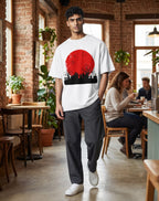 Tribe Neo 91 oversized white cotton t-shirt with a red blood moon and gothic graveyard graphic worn by a man in a cafe