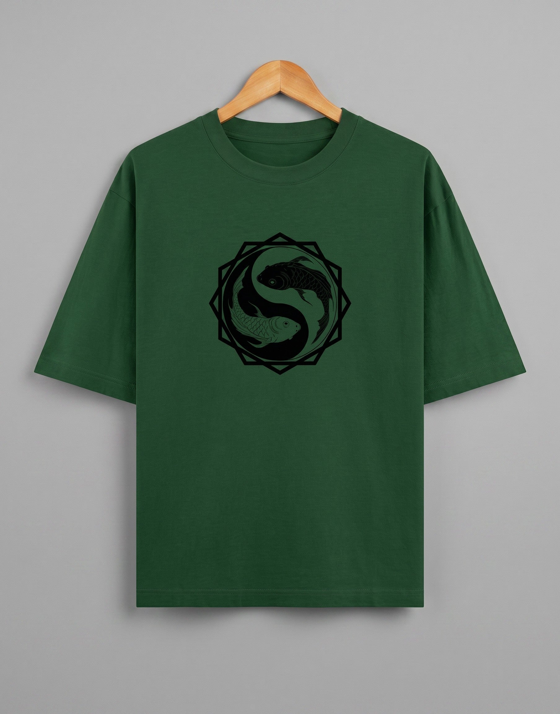 Tribe Neo 91 dark green oversized cotton t-shirt with a black koi fish yin yang graphic in an octagon frame.