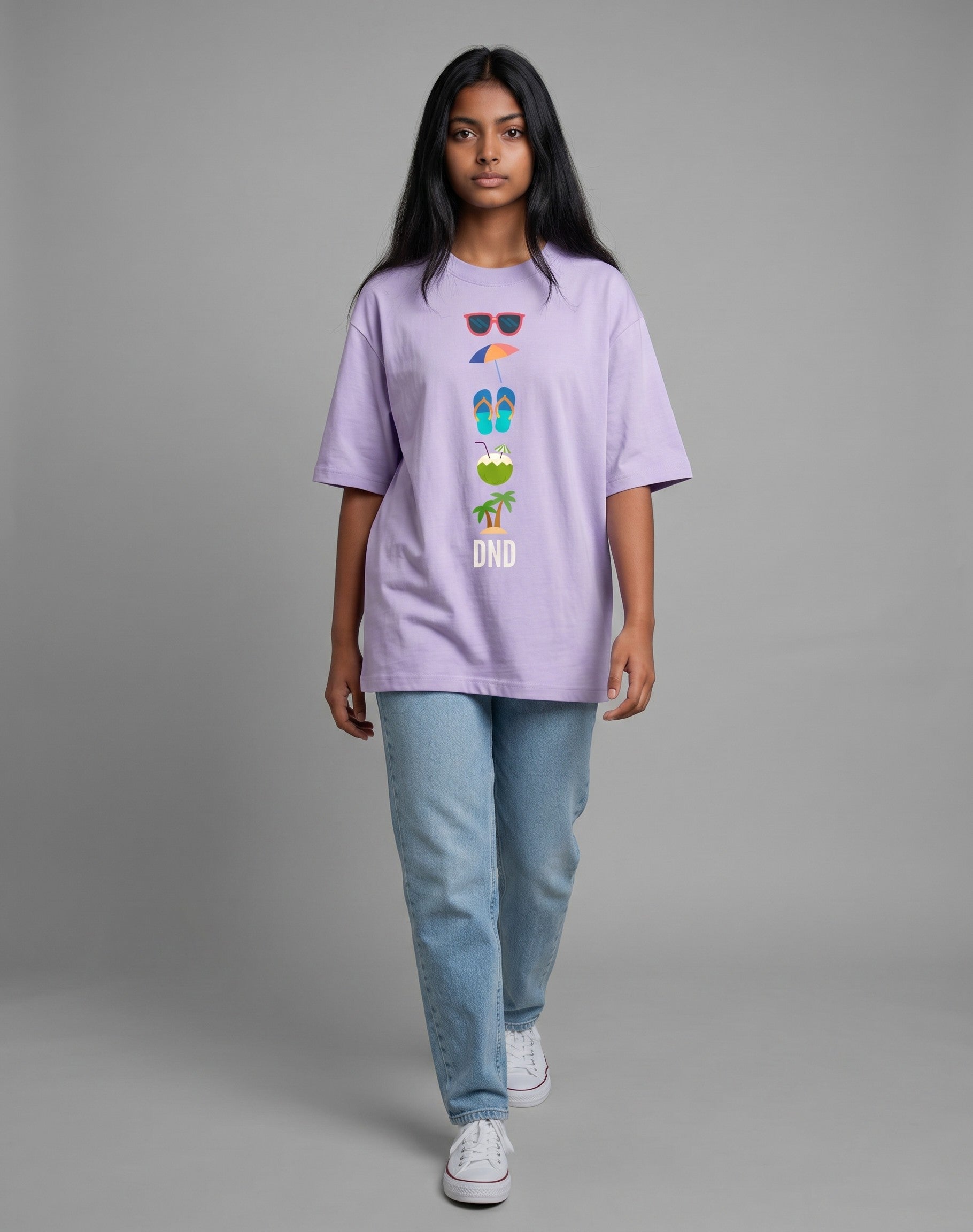 Model wearing a Tribe Neo 91 lavender oversized cotton t-shirt with a colourful beach icon graphic and DND text.