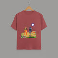 Tribe Neo 91 unisex maroon cotton t-shirt featuring a whimsical robot and girl graphic print on a hanger