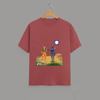Tribe Neo 91 unisex maroon cotton t-shirt featuring a whimsical robot and girl graphic print on a hanger