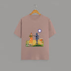 Tribe Neo 91 mauve cotton unisex t-shirt featuring a whimsical robot and human graphic print on a wooden hanger