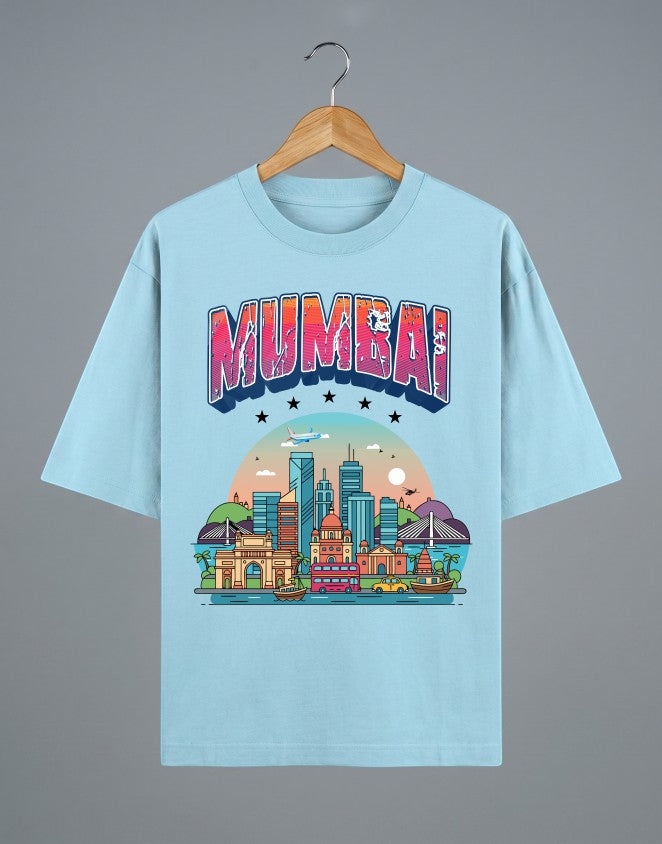 Tribe Neo 91 light blue oversized cotton t-shirt featuring a vibrant Mumbai skyline graphic and collegiate lettering.