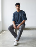 Tribe Neo 91 navy blue acid wash oversized cotton t-shirt with a minimalist XX dead face emoji on the chest