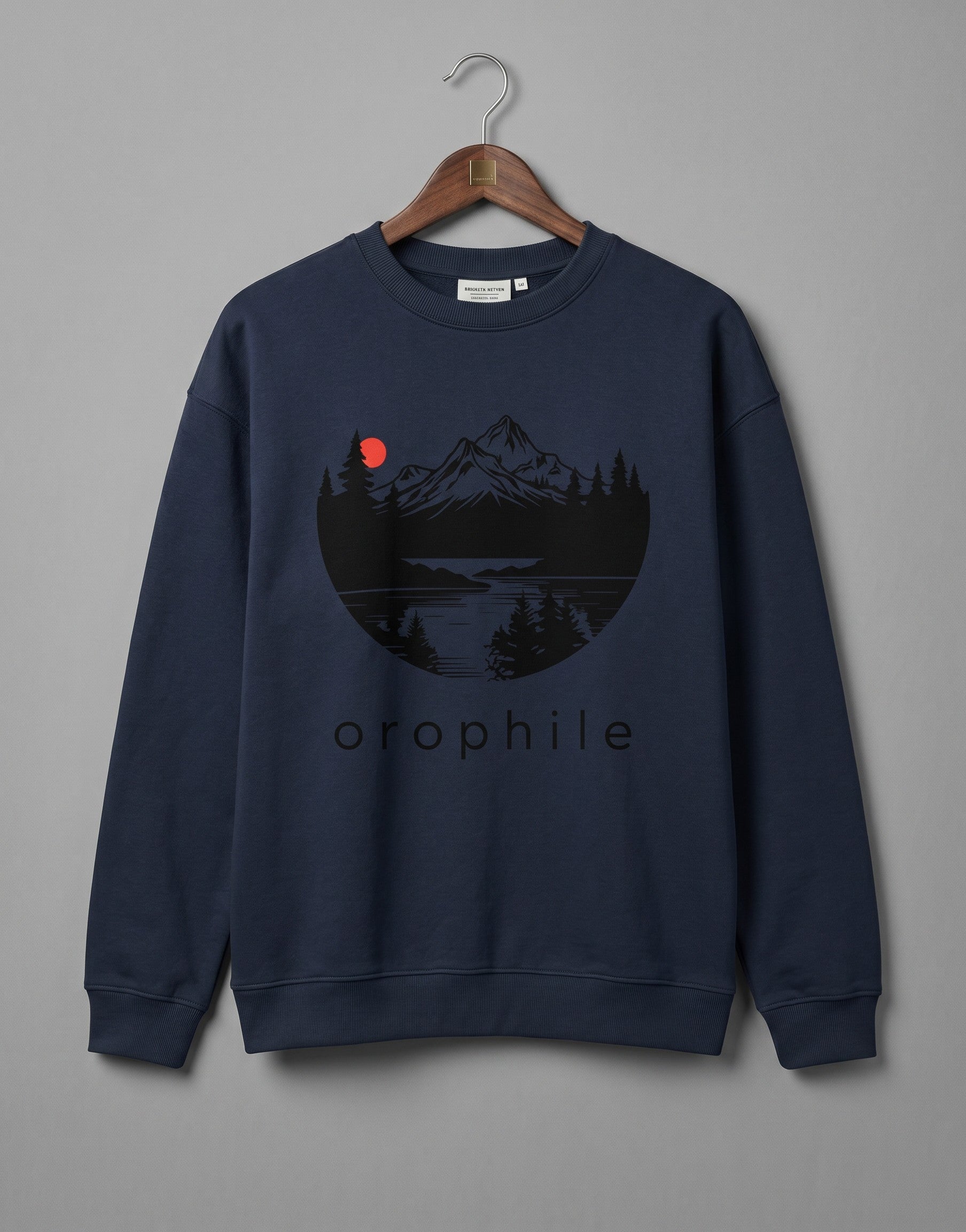 Tribe Neo 91 navy blue oversized fleece sweatshirt with a circular mountain landscape graphic and red sun accent.