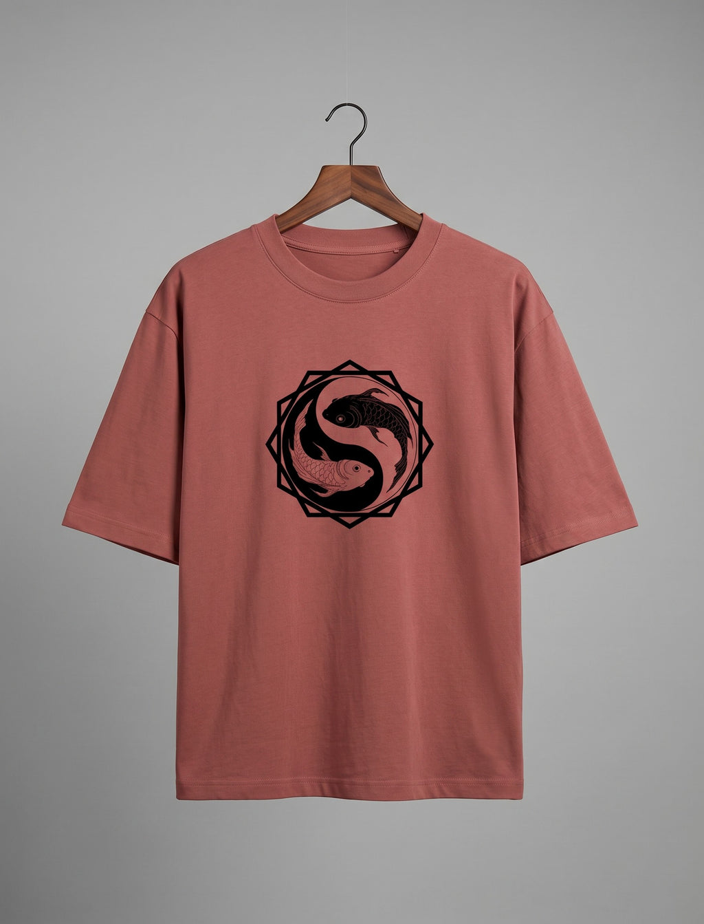 Tribe Neo 91 oversized dusty rose cotton t-shirt featuring a black koi fish yin yang graphic in an octagon frame.