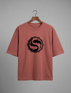 Tribe Neo 91 oversized dusty rose cotton t-shirt featuring a black koi fish yin yang graphic in an octagon frame.