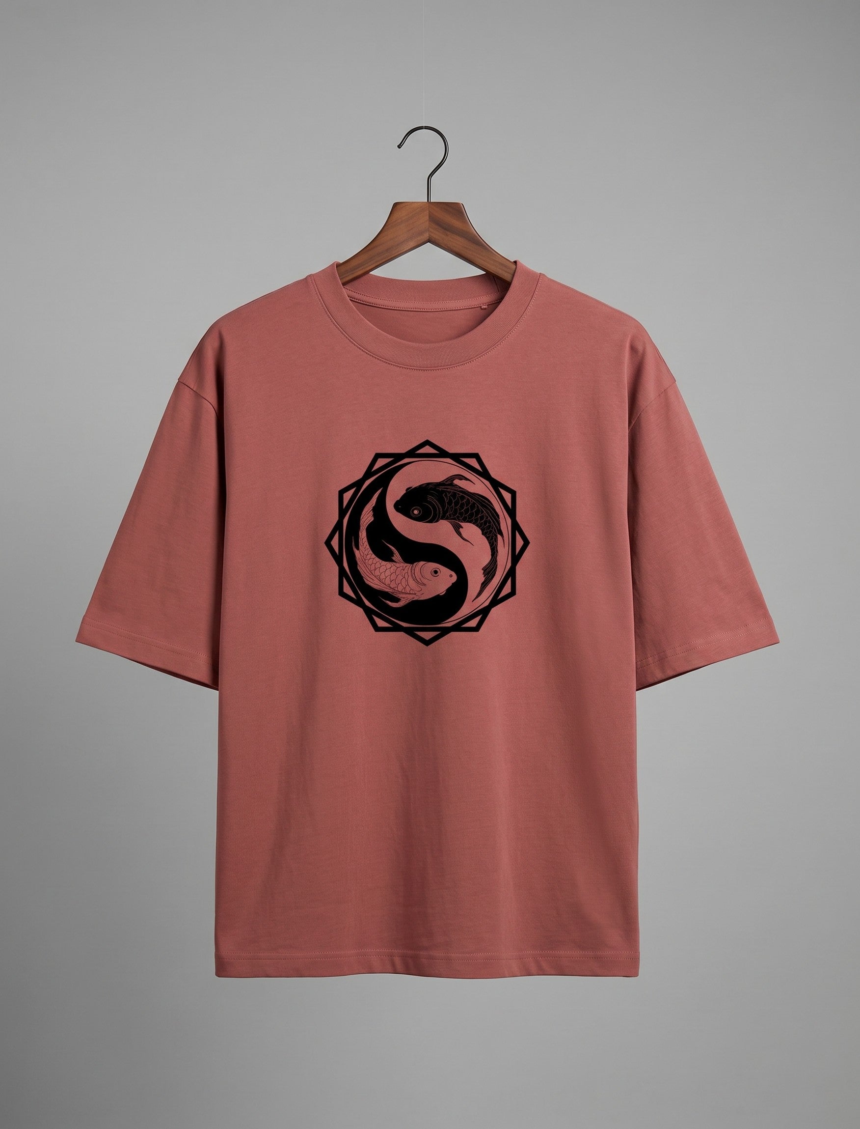 Tribe Neo 91 oversized dusty rose cotton t-shirt featuring a black koi fish yin yang graphic in an octagon frame.