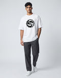 Tribe Neo 91 white oversized cotton t-shirt with a black and white koi fish yin yang graphic on a male model