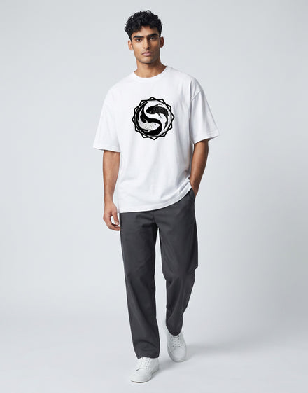 Tribe Neo 91 white oversized cotton t-shirt with a black and white koi fish yin yang graphic on a male model