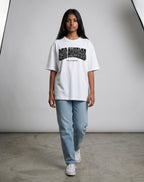 Tribe Neo 91 white oversized cotton t-shirt with Los Angeles California graphic print worn by a woman with jeans.